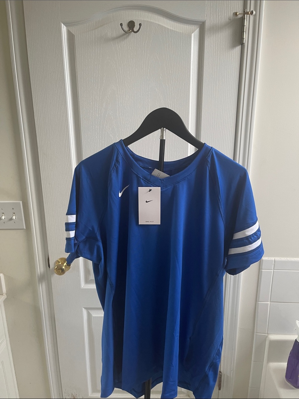 Women’s Nike Royal Blue Short-Sleeve Performance Top with White Sleeve Stripes